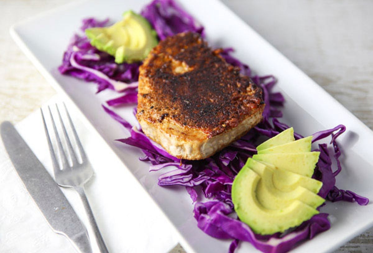 blackened tuna steak on a plate