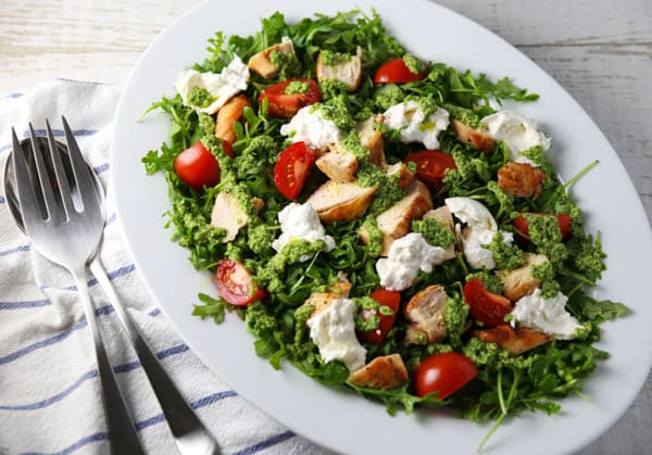 This Grilled Chicken Burrata Salad with Basil Pesto Dressing is loaded with flavor! Trust me, this will be your new favorite salad to enjoy year round! #keto #glutenfree #salad #burrata #healthyrecipes #grilling #chicken