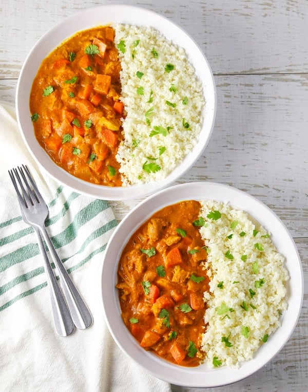 This Spicy Chicken Curry with Cauliflower Rice comes together in about 30 minutes and is loaded with flavor! #lowcarb #glutenfree #chicken #curry #cauliflowerrice #dinner