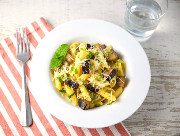 This Penne with Eggplant and Mint can be made in about 10 minutes and is bursting with so much flavor! #glutenfree #pasta #Italianfood #vegetarian