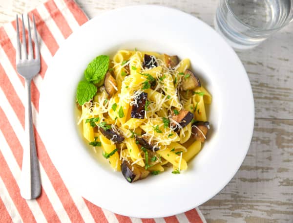 This Penne with Eggplant and Mint can be made in about 10 minutes and is bursting with so much flavor! #glutenfree #pasta #Italianfood #vegetarian
