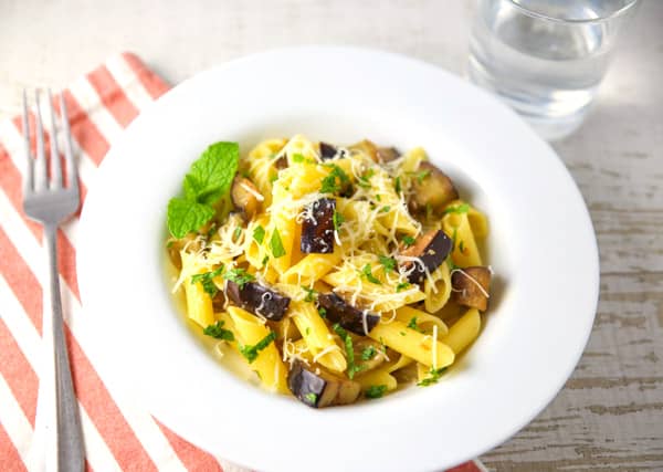 This Penne with Eggplant and Mint can be made in about 10 minutes and is bursting with so much flavor! #glutenfree #pasta #Italianfood #vegetarian