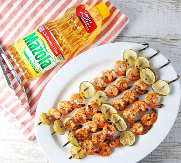 ad - Today I put together an easy peasy grilling recipe for these Grilled Chili Lime Shrimp Kabobs! This is a super easy recipe that everyone is sure to love! #MyMazolaMarinade #shrimp #kabobs #grilled