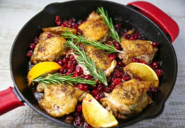 Cranberry Orange Chicken Thighs with Rosemary in skillet