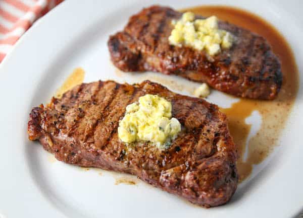New York Strip Steaks with Blue Cheese Butter on top