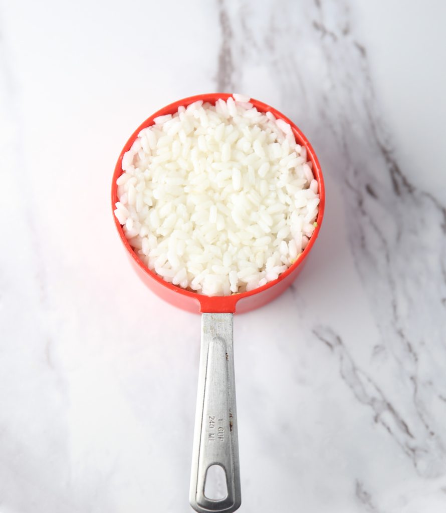 rice in a measuring cup