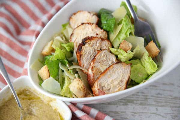 Blackened Chicken Caesar Salad with a fork