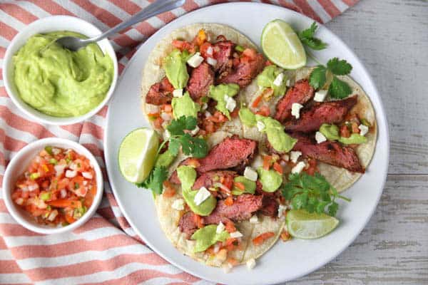 Blackened Flank Steak Tacos with Avocado Lime Sauce