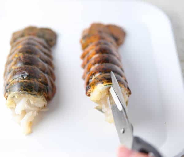 Cutting the shell of the lobster tail