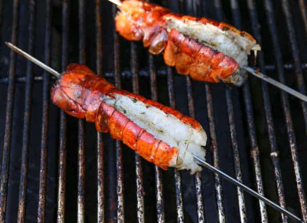 Skewered lobster tails on the grill