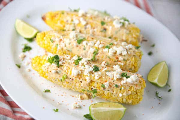 Grilled Mexican Street Corn on a platter