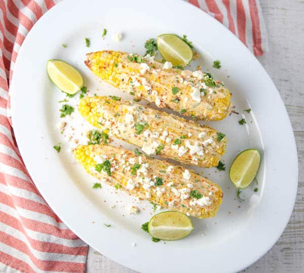 Grilled Mexican Street Corn on a platter