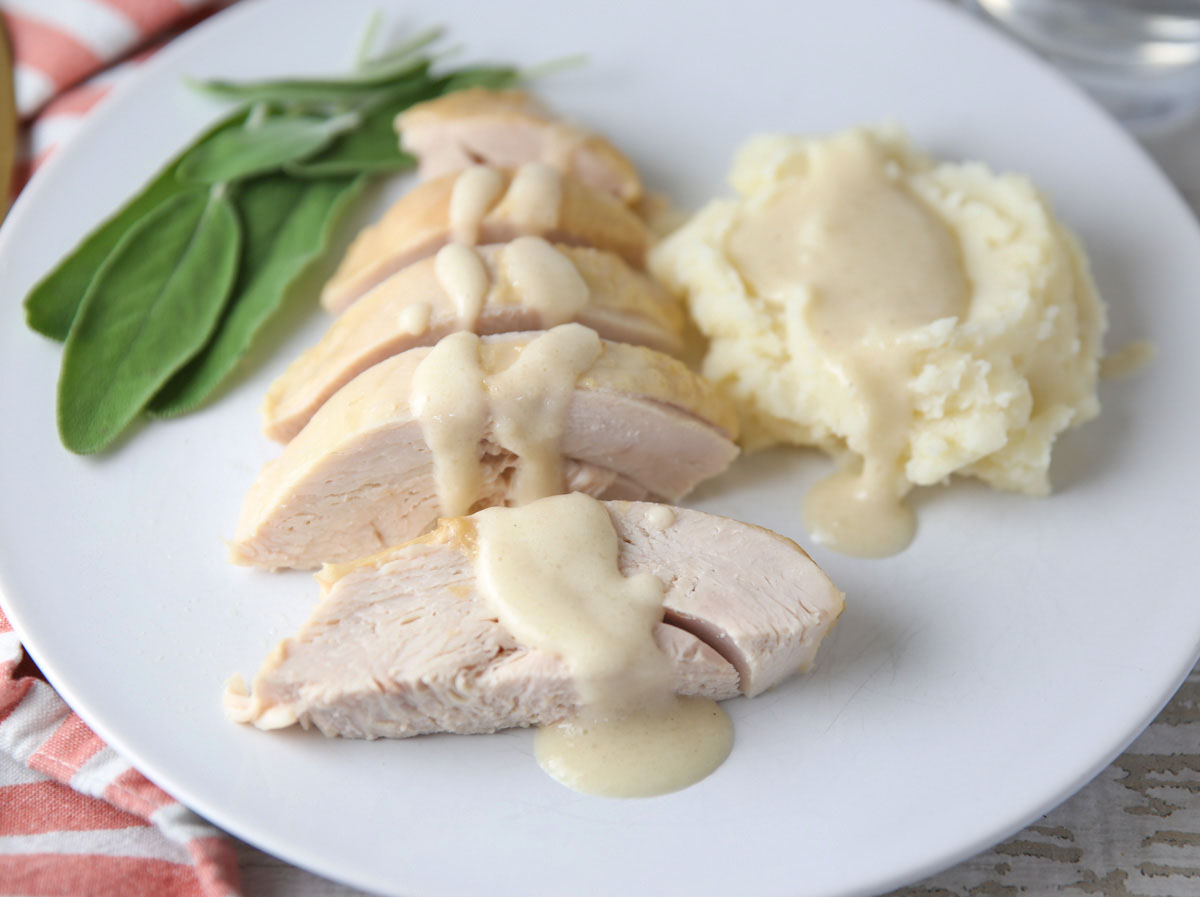 Slow Cooker Turkey Breast with White Wine Gravy and mashed potatoes