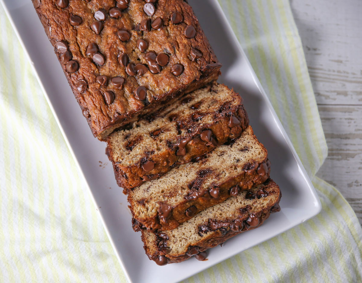 gluten free chocolate chip banana bread sliced on a plate